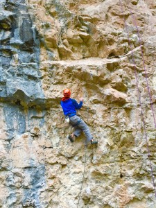 Climbing Peaceful Revolution (5.10c) during a Vertical Mind Clinic.